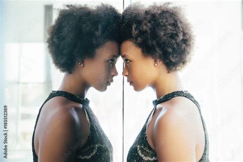Babe Woman Looking At Reflection In Mirror Stock Photo Adobe Stock