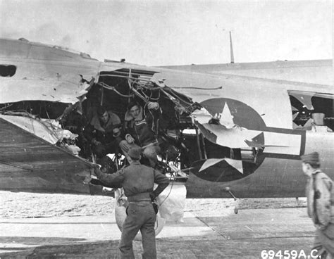 Photo Crews Examine Flak Damage To B 17g Fortress At Raf Bassingbourn