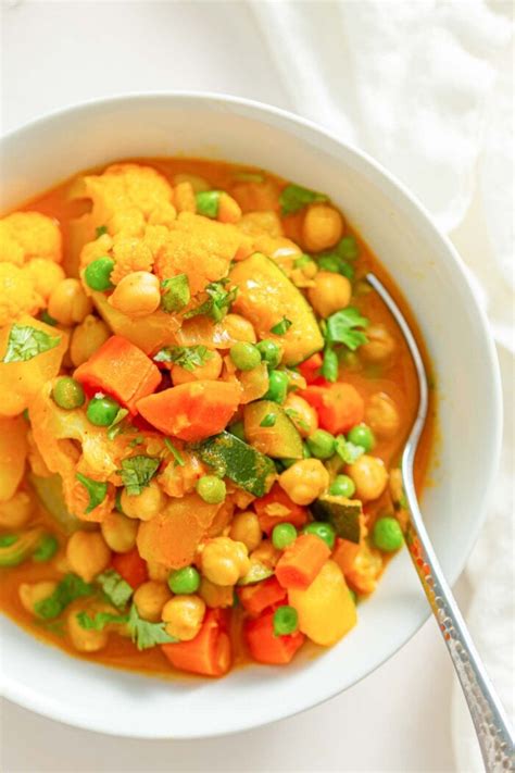 Curried Chickpea Potato Stew With Peas Cauliflower And Carrot