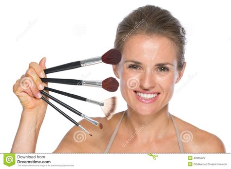 Portrait Of Happy Young Woman With Makeup Brushes Stock Image Image