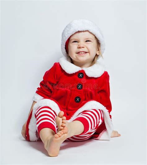 Christmas Child In Santa Hat Opening Xmas T Box Stock Image Image