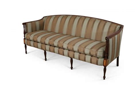 Crafted from solid wood, it showcases an arched silhouette and traditional accents like pad feet, a camelback, and carved arms, while the wood frame is finished with. Chippendale camelback yellow damask sofa with mahogany frame