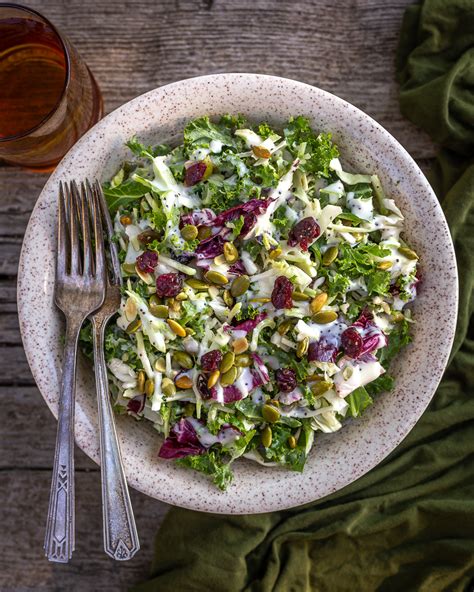 Chopped Kale Salad With Cranberries Pepitas And Creamy Poppyseed