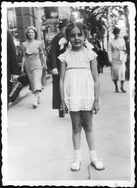 A Young Jewish Girl Poses On A Street In Prewar Poland Collections