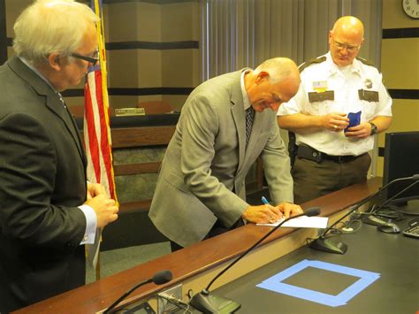 Sheriff Don Gudmundson signing oath | Sheriff, County sheriffs, Oath