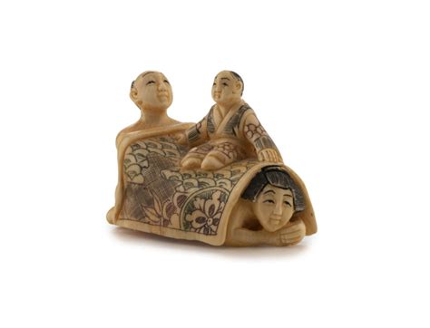 a japanese erotic carved ivory netsuke with hand coloured finish 20th century 4cm high 5cm long