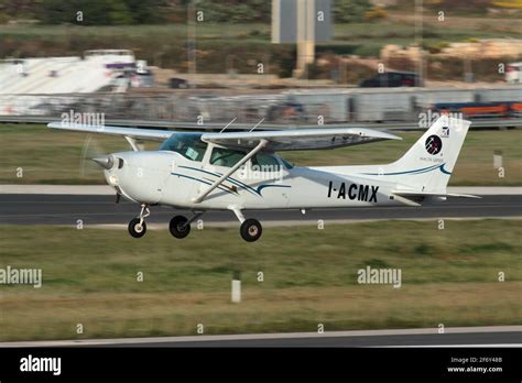 Cessna 172 Skyhawk Small Private Plane Performing Touch And Goes At