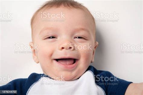 Six Month Old Baby Boy Laughing Stock Photo Download Image Now 6 11