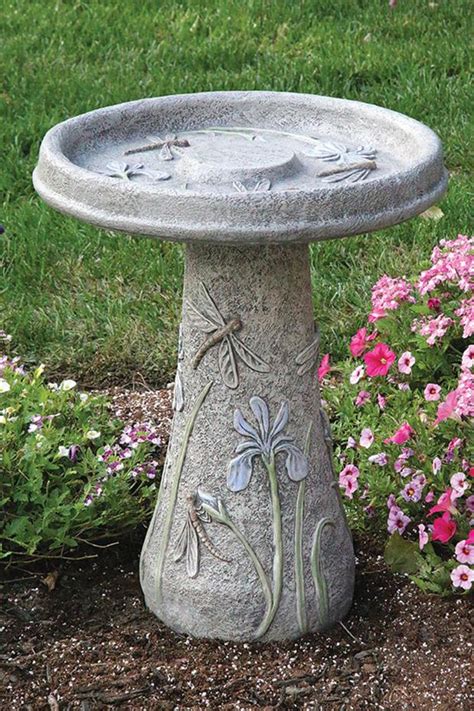 Shaking the snow off his coat, sir walter wally forecast an early spring for raleigh — a. Dragonfly Bird Bath | White House Gardens | Cornelius, NC