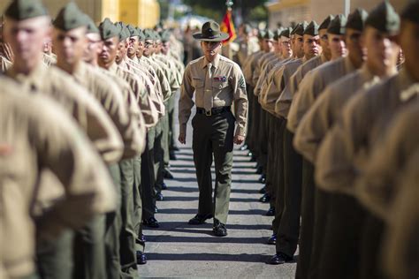 Marine Corps Staff Sgt Peter Santiago Inspects A Platoon At Marine