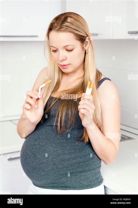 Decide With The Belly Hi Res Stock Photography And Images Alamy