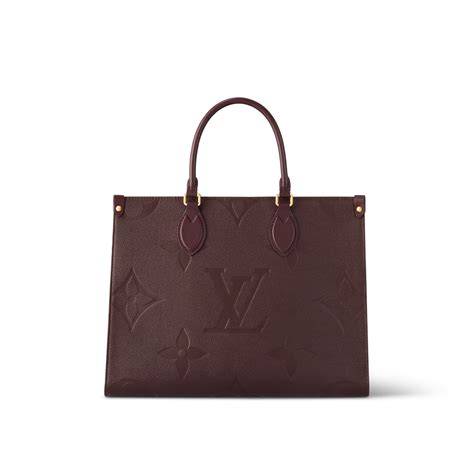Onthego Mm Monogram Empreinte Leather Women Handbags Louis Vuitton