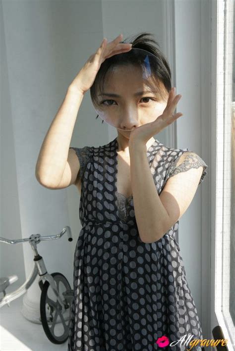 Mari Hoshino Is A Sexy Glamour Model Posing In Her Minidress