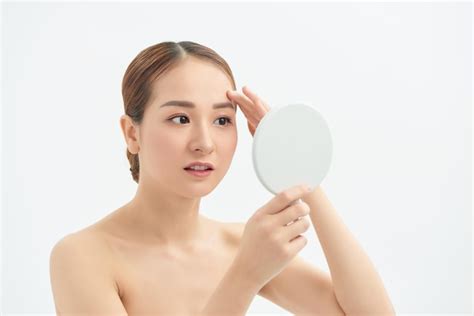 Premium Photo Beautiful Asian Woman Checking Her Skin Skin Care Acne