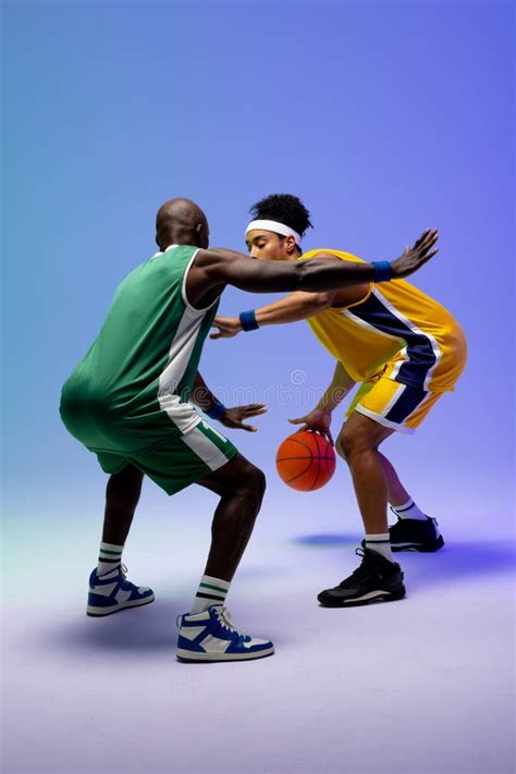 Image Of Two Diverse Basketball Players With Basketball Playing On