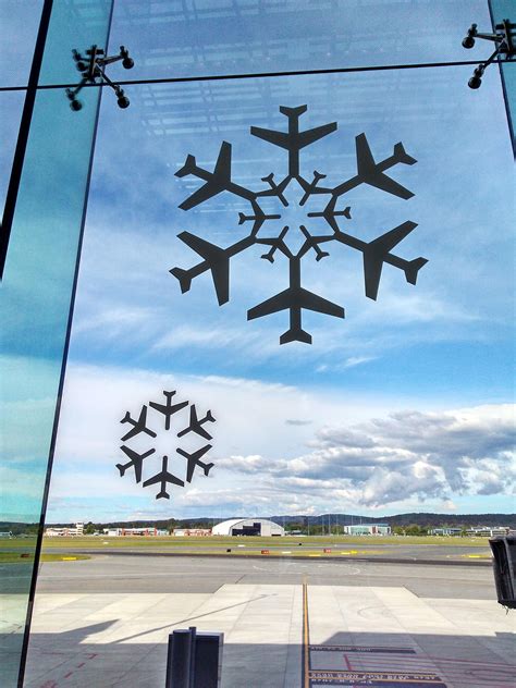 The Airport Snowflake Decorations For Xmas Are Made Up Of Planes