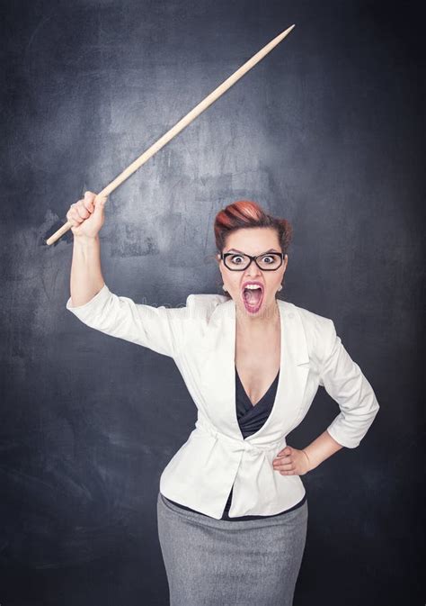 Angry Screaming Teacher With Pointer On Blackboard Background Stock