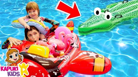 Summer Vacation And Kids Activities At The Swimming Pool Inflatable