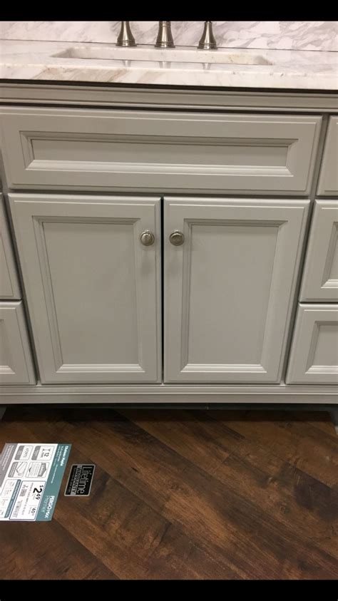 For orders in knotty alder or rustic maple, knots may be in locations that affect placement of decorative hardware. pieced this together at Lowes. ergo chateau maple laminant ...