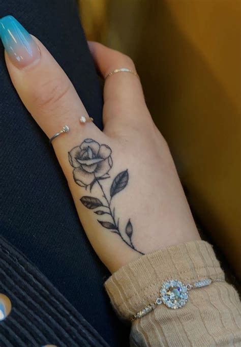 Rose Tattoo Hand And Finger Tattoos Discreet Tattoos Hand Tattoos