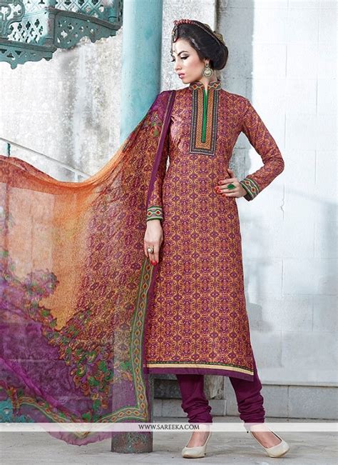 stand out from rest with this multi colour cotton churidar designer suit the ethnic print work