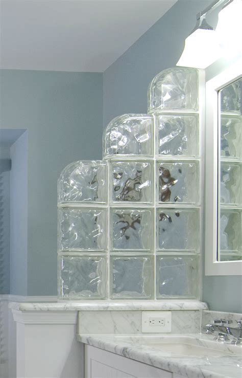 The Glass Block Divider In This Bathroom Offers Privacy Between The