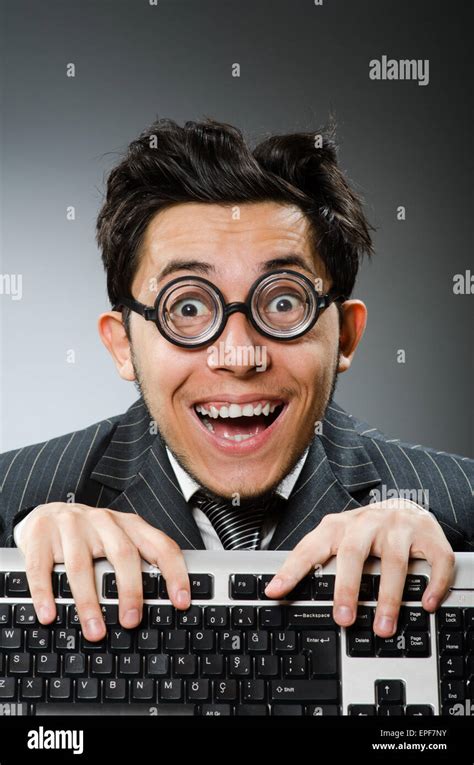 Comouter Geek With Computer Keyboard Stock Photo Alamy