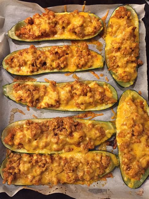 Place boats on the prepared baking sheet and fill each one with as much taco meat mixture as will fit. Stuffed Baked Zucchini Boats With Ground Meat And Cheese ...