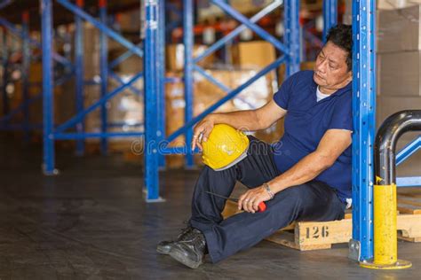 Fatigue Senior Adult Worker Napping Sleep At Work Exhausted Warehouse