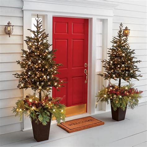 The Estate Door Prelit Christmas Tree Planter Hammacher Schlemmer