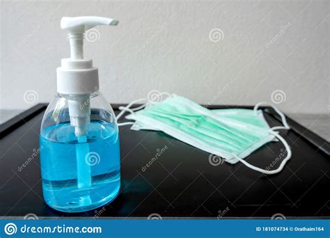 Picture Of Medical Surgical Mask And Alcohol Hand Sanitizer Wash Dirt