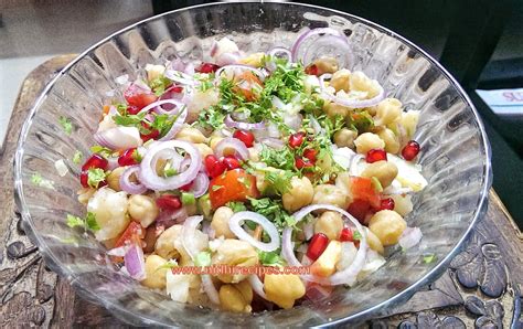 Papdi chaat is the usual starter in most of our potluck parties and one of my friend makes this so well, but we always use store bought papdis. Chana Chaat - Nidhi Recipes