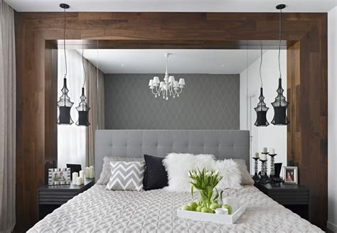 A contrasting bedroom wiht a an elegant moody bedroom with dark walls, a catchy chandelier, artworks, an animal rug and leather chairs. 20 Small Bedroom Ideas That Will Leave You Speechless ...