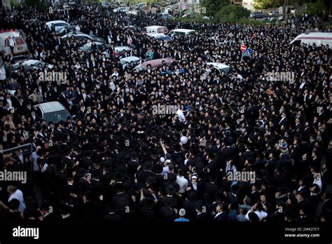 Ultra Orthodox Jews Watch The Funeral Procession Of Rabbi Of The Kaliv