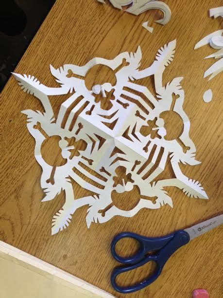 Skull And Cross Bones Paper Snowflake By Artist Daniel