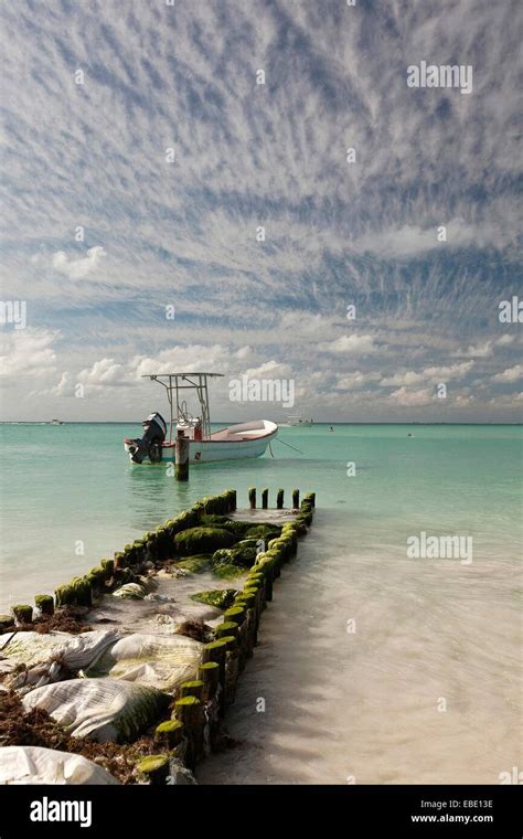 A Damaged Pier And A Boat On Isla Mujeres Island Cancun Quintana Roo