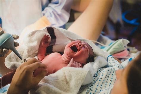 Birth Of Newborn Baby At Hospital Del Colaborador De Stocksy Lauren