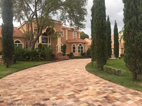 Brick driveway pavers can certainly provide curb appeal that is enriched with beauty, wonderful. Tampa driveway paver project | Driveway landscaping, Brick paver driveway, Paver driveway