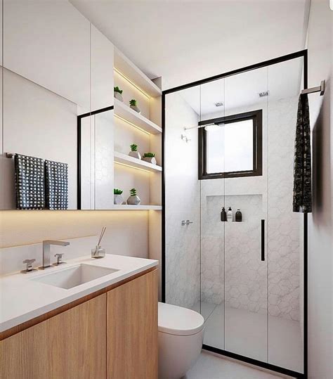 Kamar mandi ini memiliki desain dinding yang menarik, dilapisi kombinasi warna hitam dan abu sedangkan sisi lain memilih warna. Desain Dapur Dan Kamar Mandi Minimalis