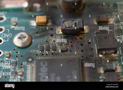 Burnt Electronic Parts On Printed Circuit Board Stock Photo Alamy