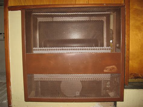 Experiencing problems with your heating unit? Old wall heater - how to remove the surround for outdoors ...