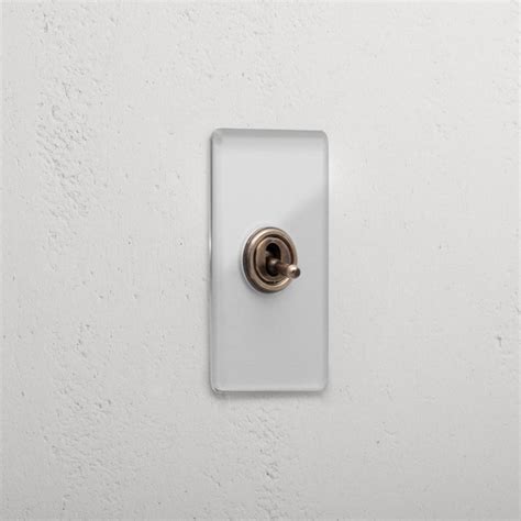 1g Architrave Retractive Toggle Switch Clear Antique Brass Corston