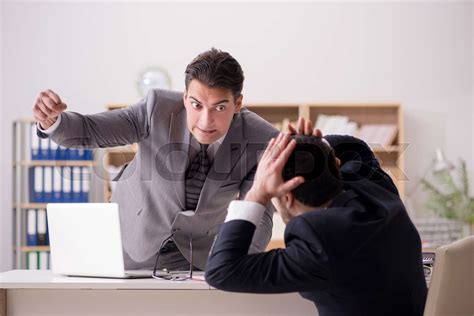 Angry Boss Shouting At His Employee Stock Image Colourbox