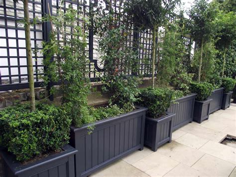 Fence paint colour for an exotic looking contemporary garden. Wooden Garden Planters & Obelisks & Towers - Essex UK, The ...