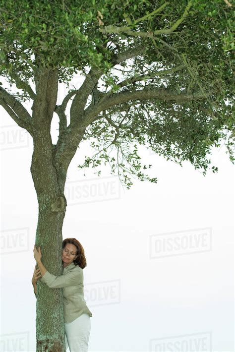 Woman Hugging Tree Stock Photo Dissolve