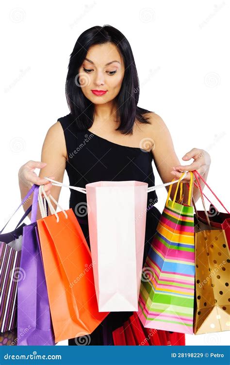 Young Brunette Woman With Shopping Bags Isolated On White Stock Image