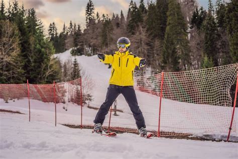 Ski Instructor At Training Track Showing Students How To Ski Stock