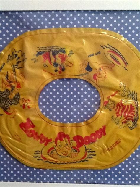 A Yellow And Blue Polka Doted Table Cloth With An Oval Shaped Object On It