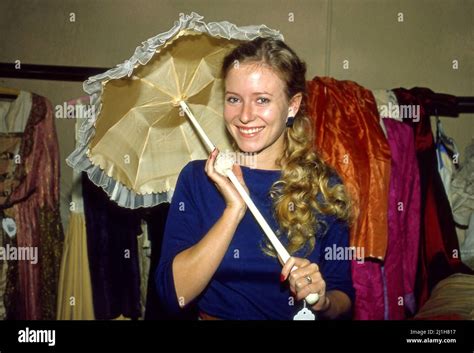 Actress Eve Plumb Who Played Jan Brady On The Hit Show The Brady Bunch Holds An Antique Parasol