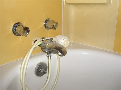 A bathtub with an installed shower screen, commonly called by users bathtub showering, is a solution very often chosen in house bathrooms. Hand Held Shower Head Attaches Tub Faucet